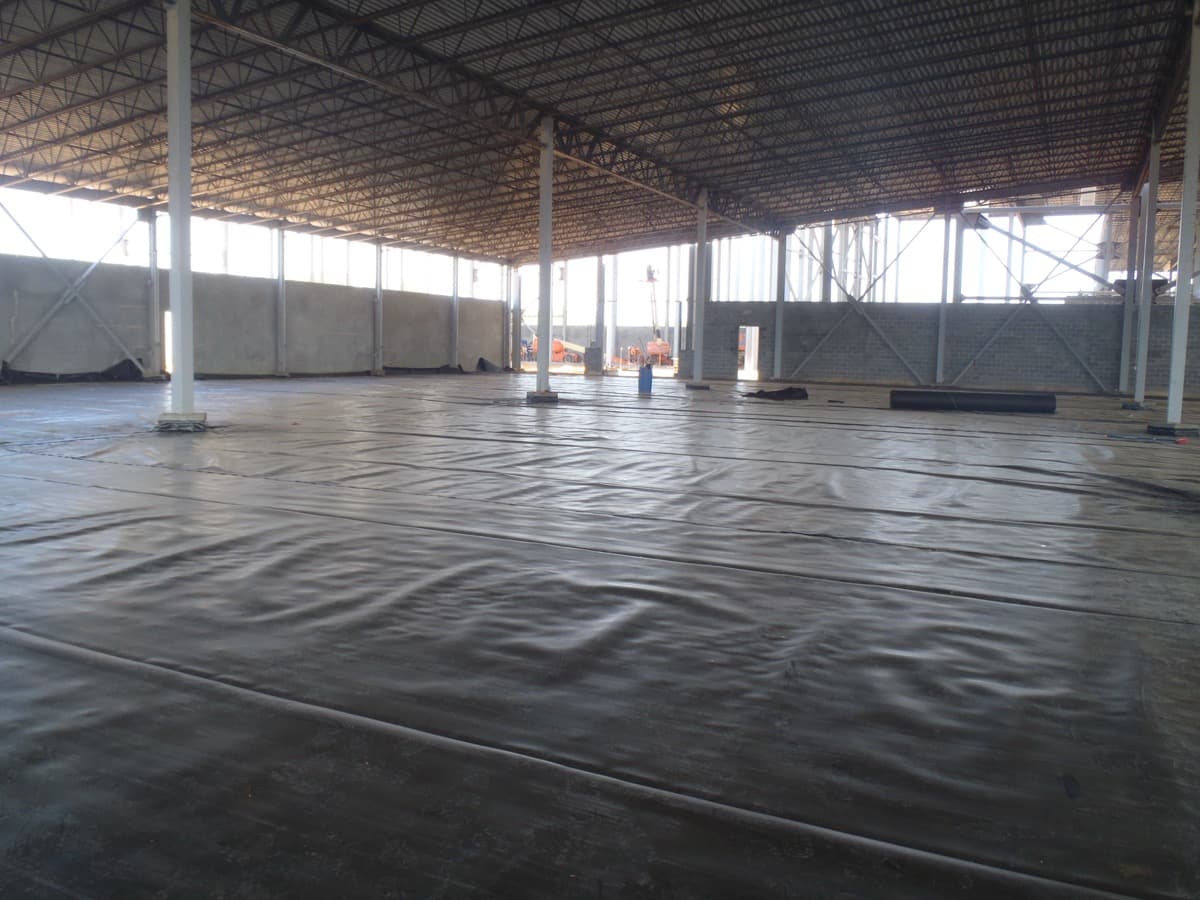 Wide view of EFI USA wastewater lagoon liner installation