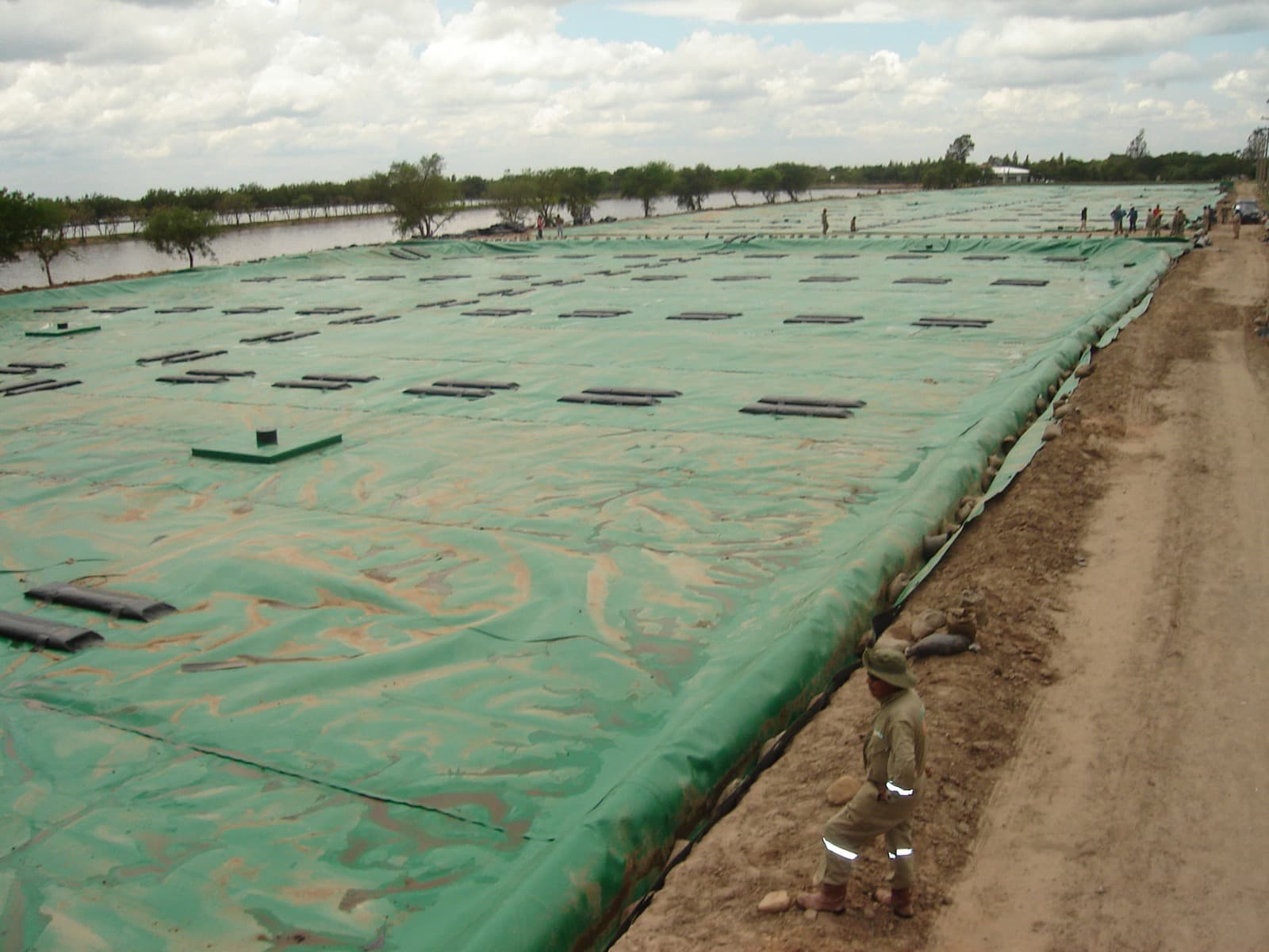 Gas-Tight vs. Permeable Lagoon Covers: When to Use Each